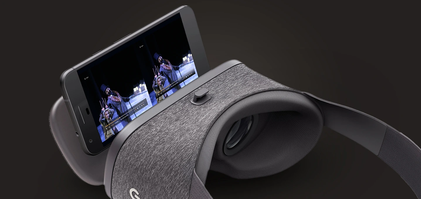 A theatre performance playing on a phone in a VR viewer